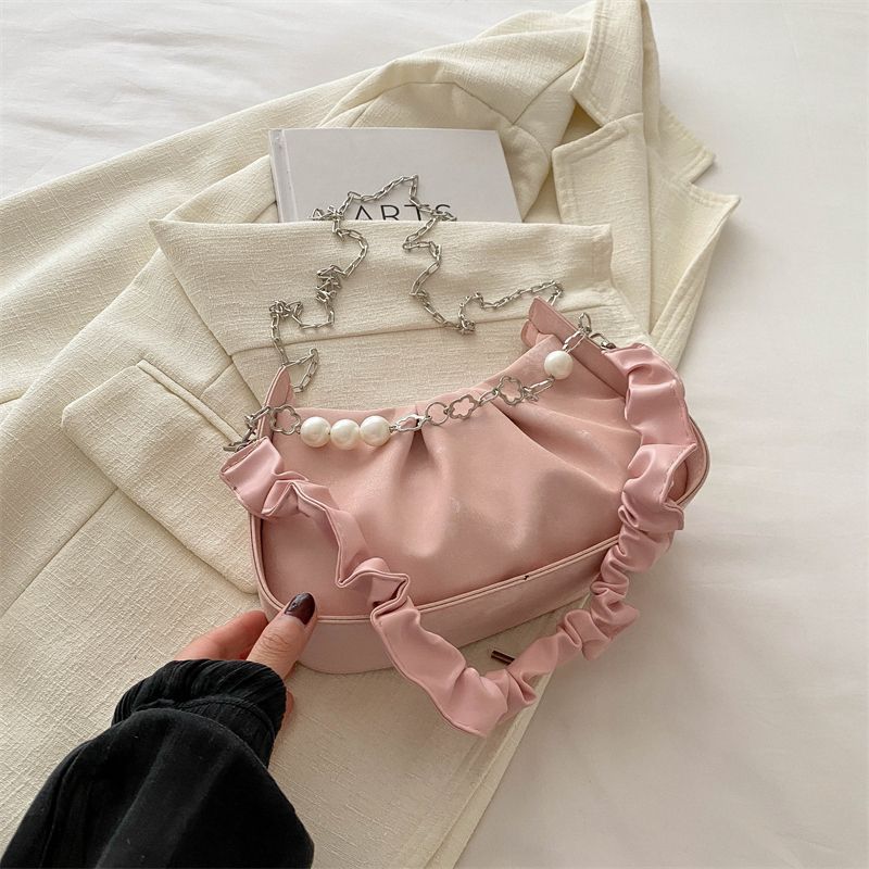

Niche design underarm bag women s new trendy fashion cloud bag French style foreign style shoulder bag pleated messenger bag рожевий