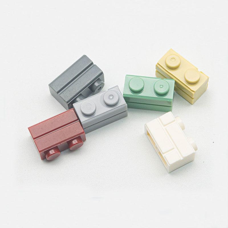 

DIY Строительные блоки Настенные фигурки Кирпич Модифицированный 1x2 Точки Кирпичная кладка Профиль 200ШТ Креативный Детский Размер Совместимый 98283 Игрушка