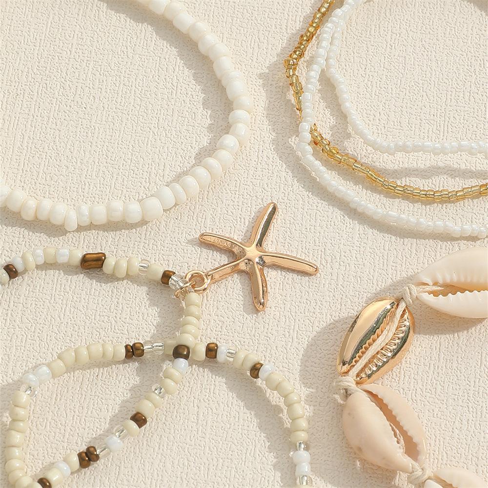 7 Pcs Stackable Starfish Pendant Bracelet Set with Mini Seed Beads - Handcrafted Beach Jewelry for Women