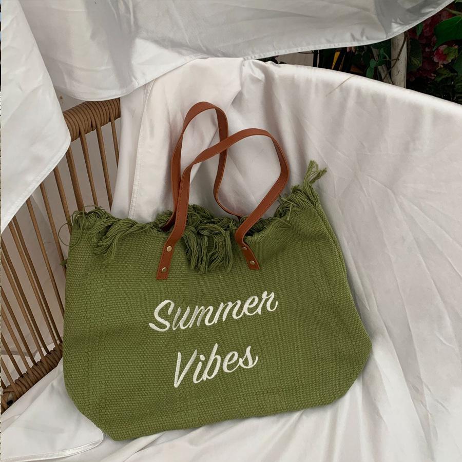 Korean Canvas Embroidered Tote: Versatile Women's Woven Beach Handbag with Tassel