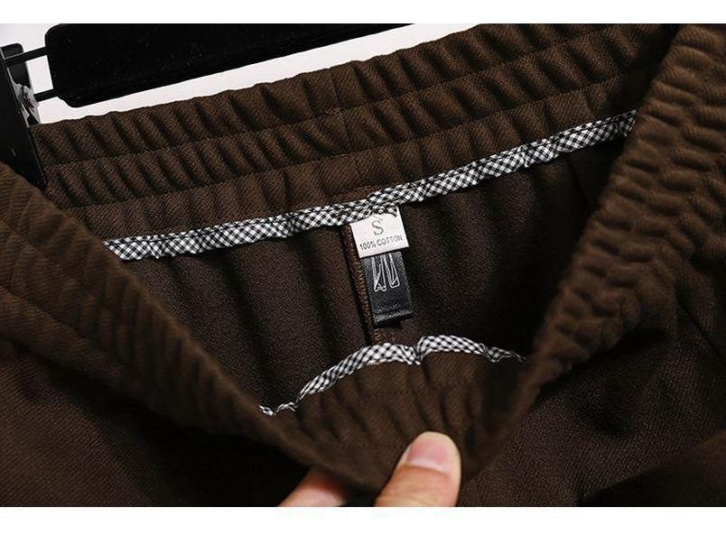 Women's Solid Color Half-Skirt with Pockets and Back Slit - Spring/Autumn Stylish, Elastic Waist, Mid-Length, Mature Style