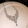 European and American retro diamond-encrusted hollow flower pendant necklace female court style collarbone chain light luxury high-end item decoration