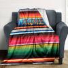 The Image Features A Vibrant Colorful Striped Fabric With Bold Horizontal Bands In Various Hues Including Red Blue Yellow Green And Black Gift