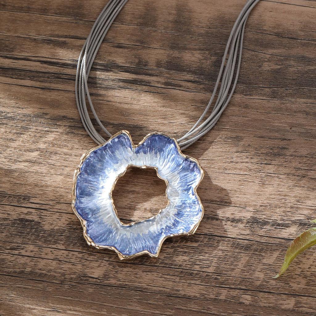 Hollow geometric flower love long necklace, women's exaggerated high-end irregular brushed pendant