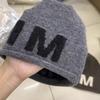 Contrasting large letters Elastic thin age reducing pile hat Children autumn and winter warm versatile Internet celebrity wool hat Knitted hat