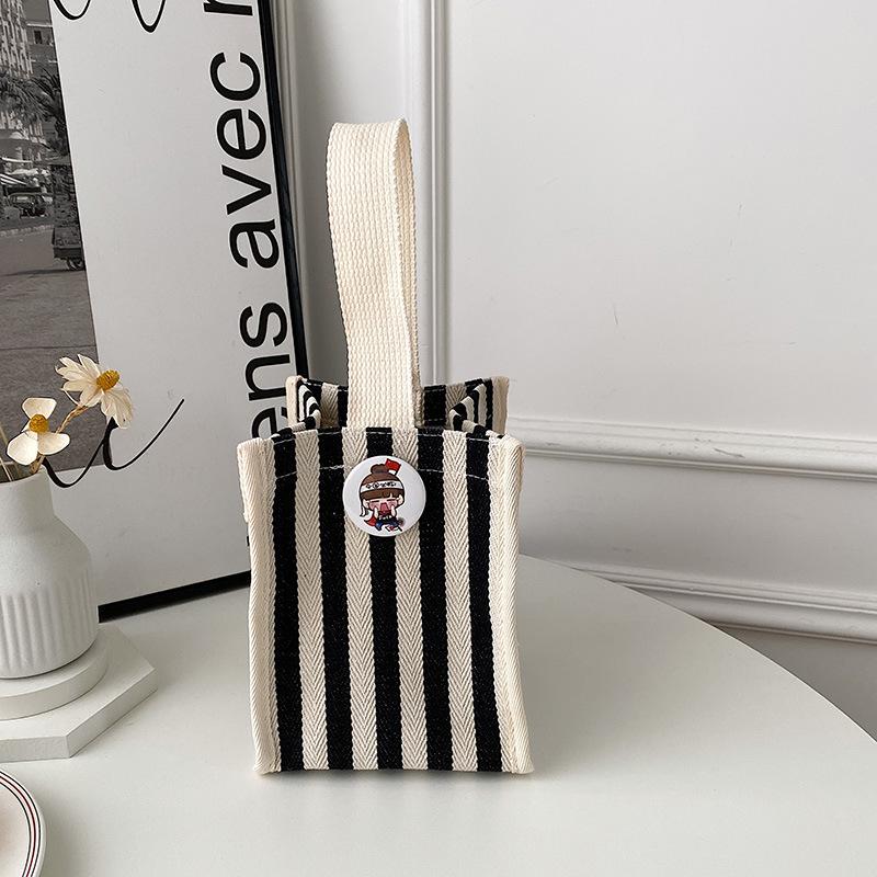 

2025 new autumn and winter simple and fashionable contrasting striped handbag mother shopping bag Korean version casual handbag чёрный