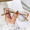 Cat's eye stainless steel floral pattern gold leg glasses frame versatile plain color-changing gray sunglasses can be matched with myopia glasses