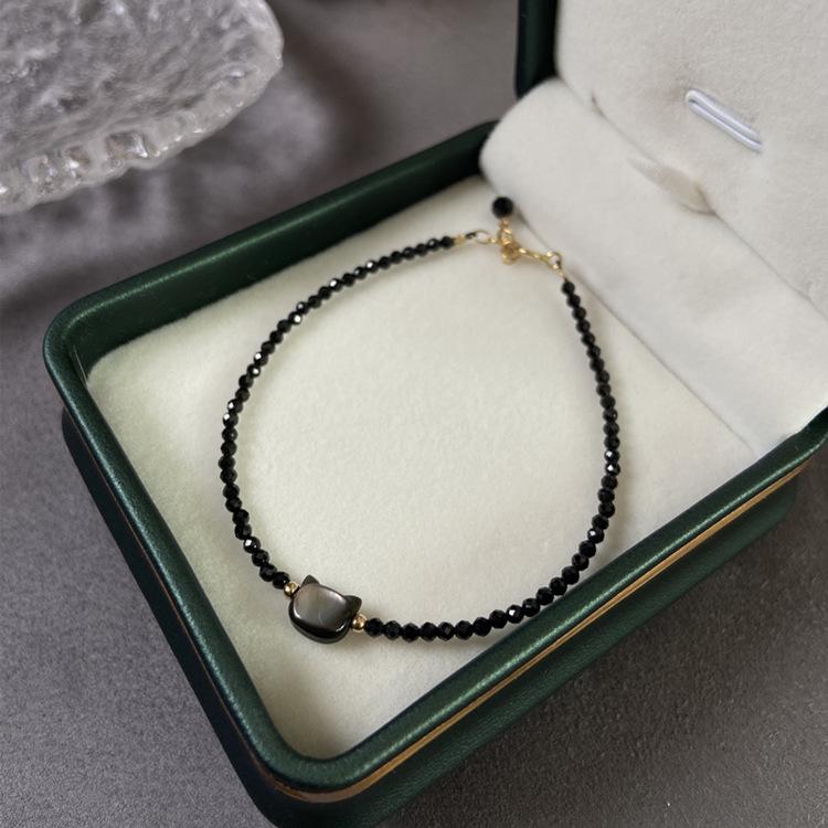 

Thin Adjustable Black & White Kitten Bracelet with Crystal, Pearls, and Spinel - Niche Japanese Jewelry