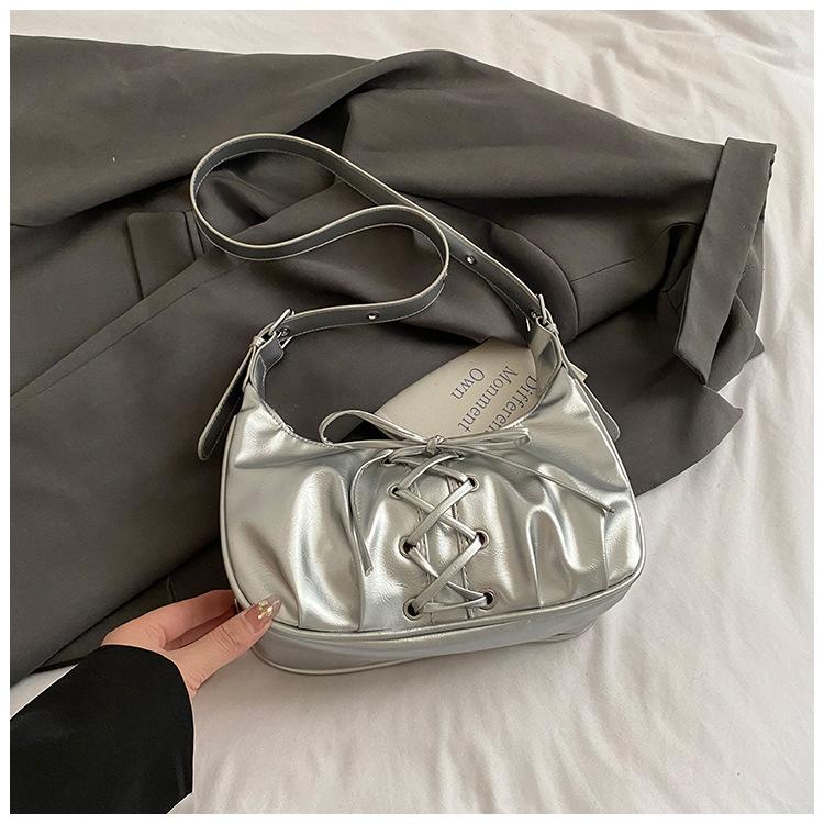 

Niche high-end bow bag women s 2025 summer new temperament shoulder bag versatile sweet and cool messenger bag серебряный