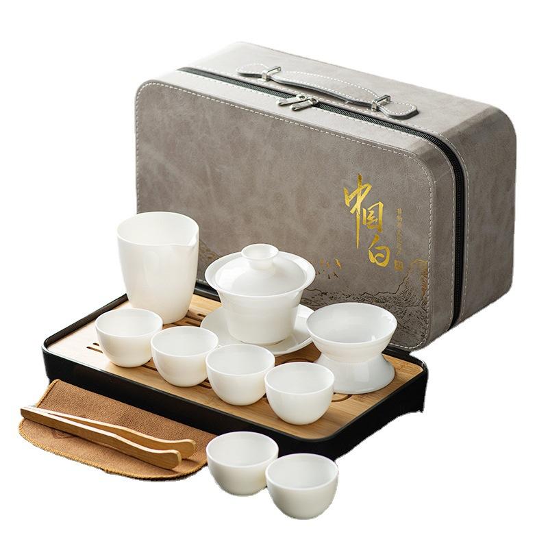 Suet jade white porcelain tea set, full set of kung fu tea set cover bowl tea cup travel tea set gift box print