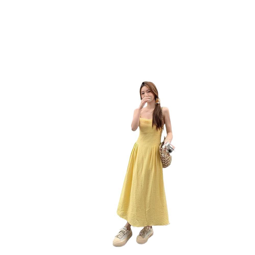 French small yellow suspender dress women's summer new waist temperament long dress seaside vacation skirt