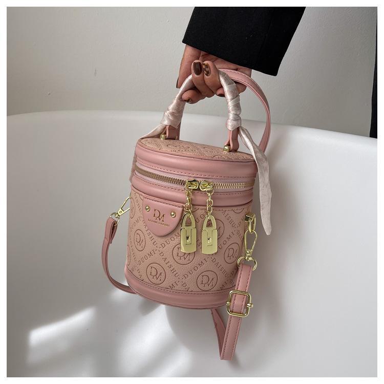 Autumn 2024 Trendy Women's Round Bucket Crossbody Bag: Solid Color, Textured, Hand-Held, and Stylish.