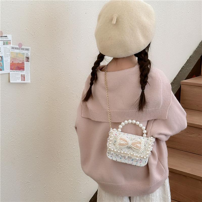 Trendy Red Mini Chain Crossbody Bag For Kids With Charming Bow Design And Lightweight Canvas Material