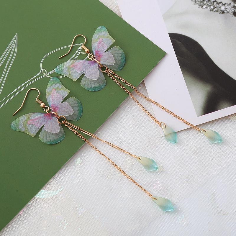 Purple Tassel Butterfly Pearl Earrings: Bold and Elegant Design