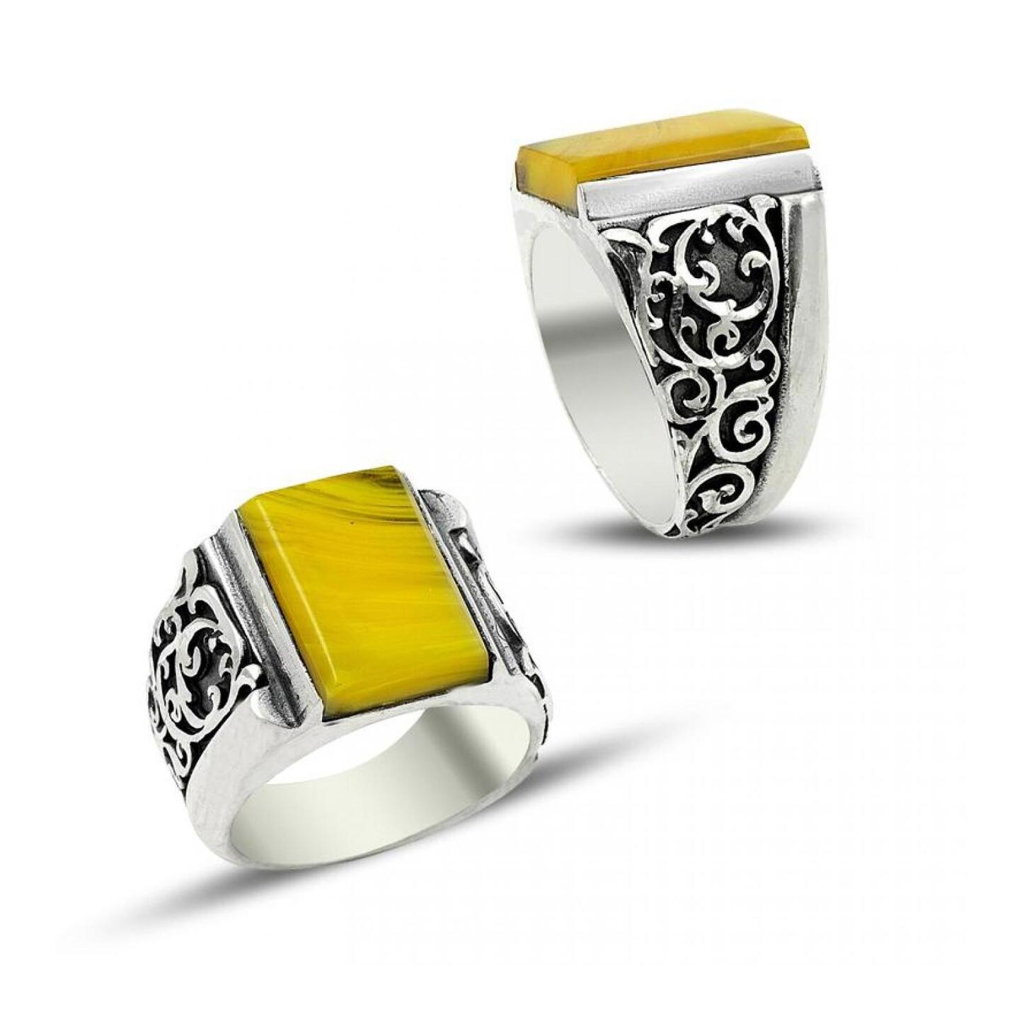 

Серебряное кольцо с выдавленным янтарем ручной работы