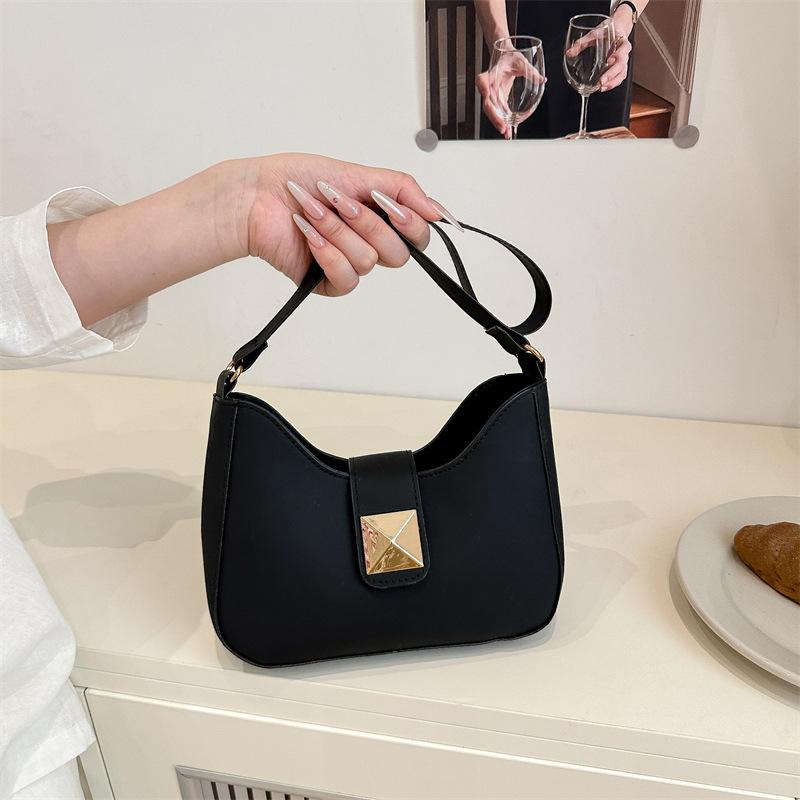 Simple new Korean version ins shoulder bag women's commuting foreign style fashion temperament exquisite solid color oily leather messenger bag