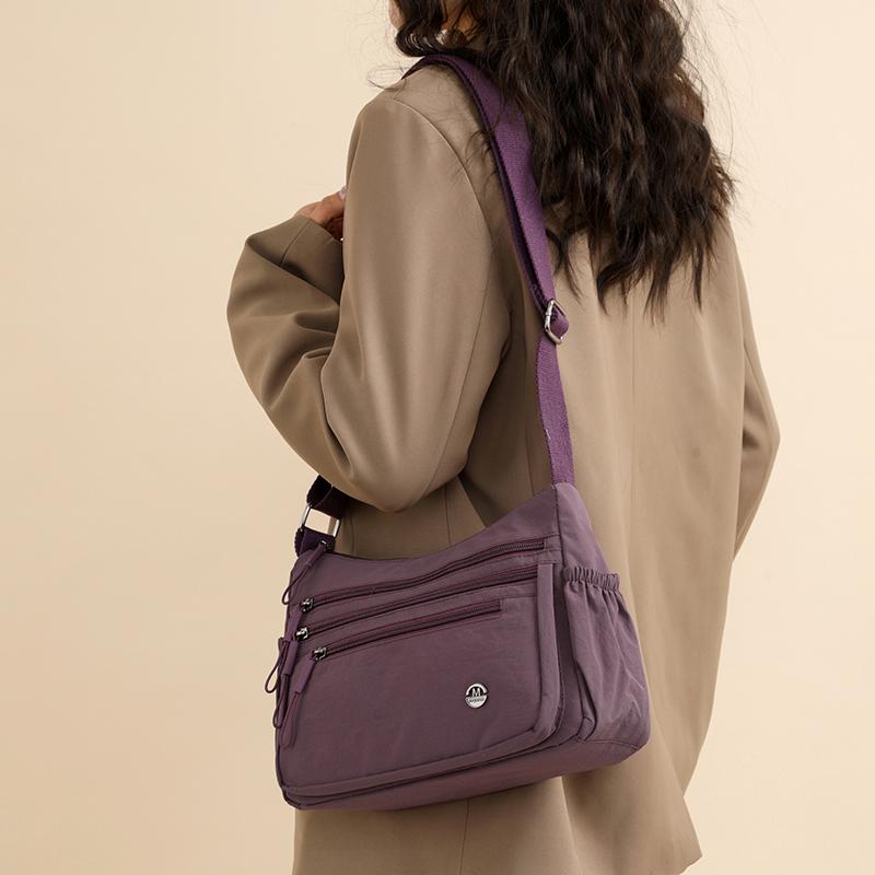 Dameskulderveske med stor kapasitet og lett vekt