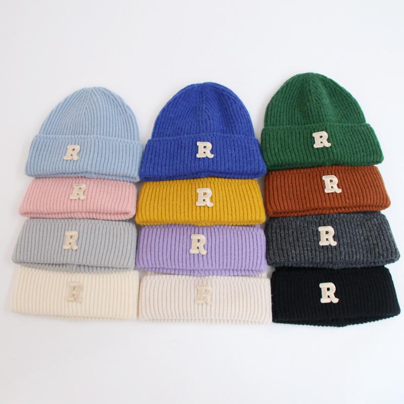 Wool hat women's autumn and winter new letter R standard knitted hat flanged ear protection warm Internet celebrity cold hat tide