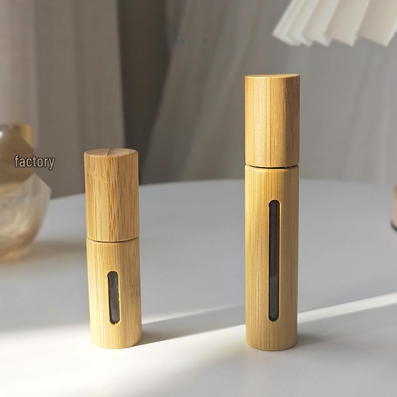 

Бамбуковый флакон-спрей со стеклянной вставкой и алюминиевым распылителем, доступный в объемах 5 мл и 10 мл, для распыления парфюмерии. 5ml Glass Spray Bottle - Window Opening