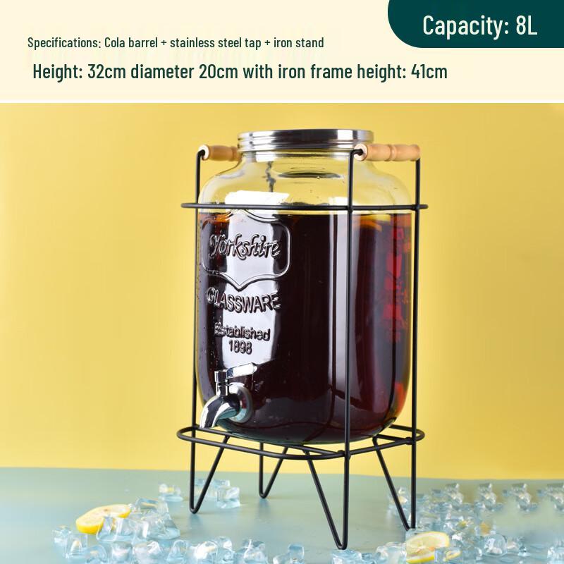 Getränkespender aus Glas mit Ständer und Zapfhahn