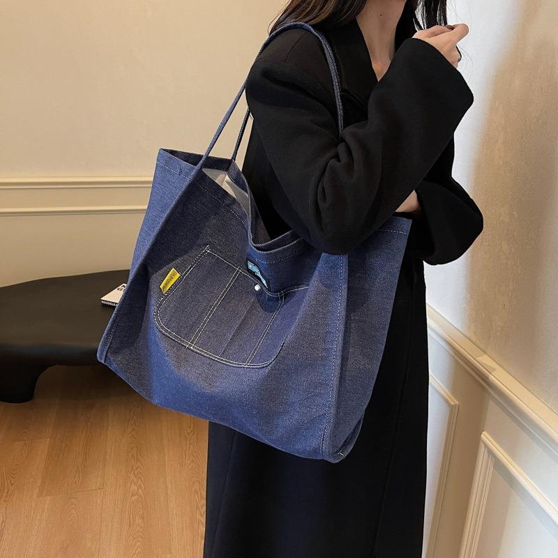 Simple and large-capacity denim tote bag women's new versatile commuter shoulder bag portable fashion shopping bag tide
