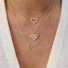 New European and American Diamond Heart Necklace Instagram Creative Retro Simple Hollow Heart Multi Layered Layered Snake Bone Chain