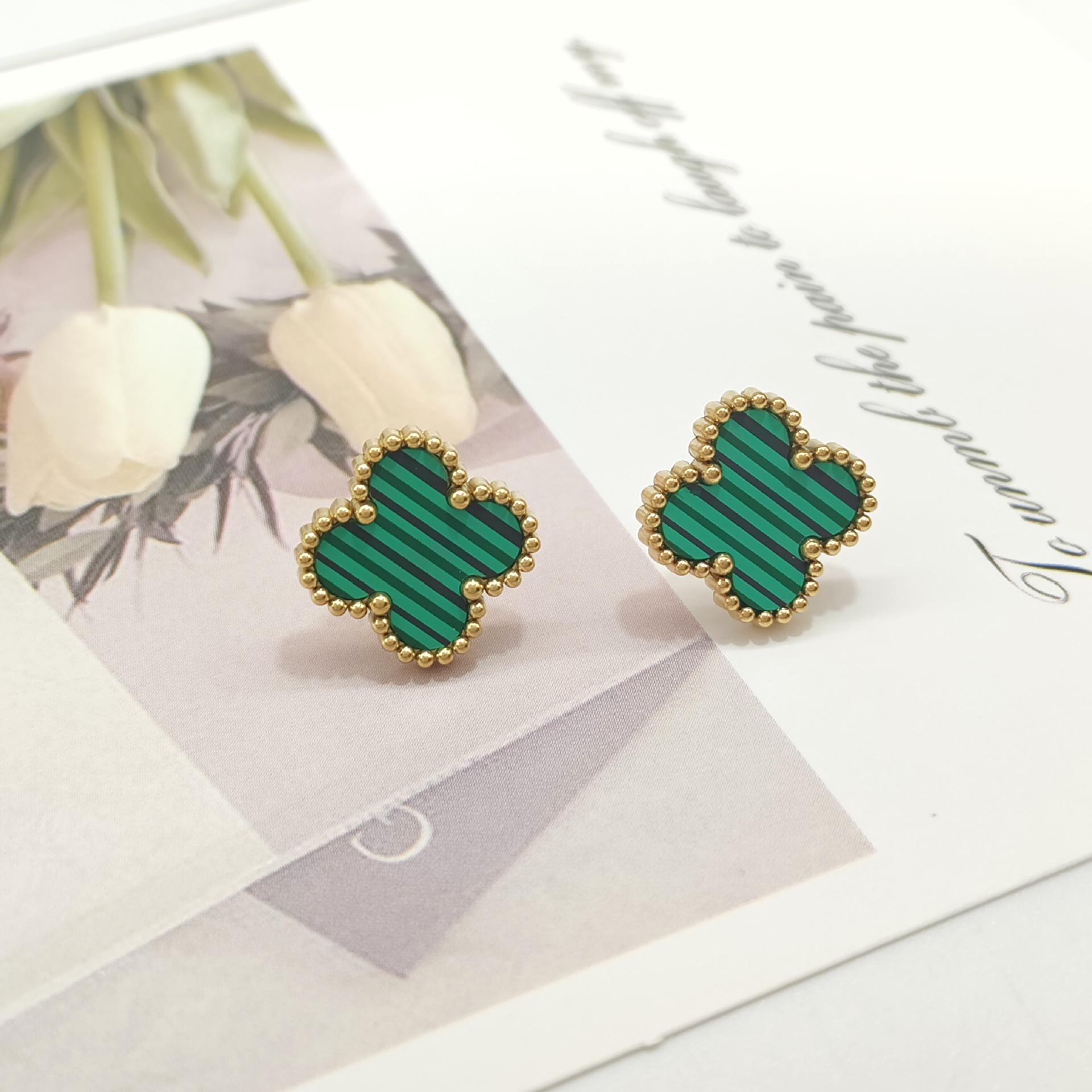 

Lucky Clover Gold-Plated Mother-of-Pearl Stud Earrings - Four-Leaf Design, Stainless Steel, Elegant and Versatile for Women.