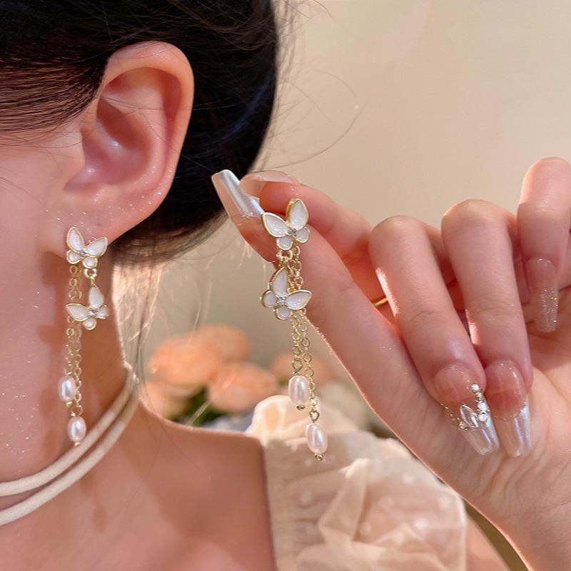 "925 Silver Long Tassel Zircon Bow Earrings for Women - Light Luxury & Versatile Design"