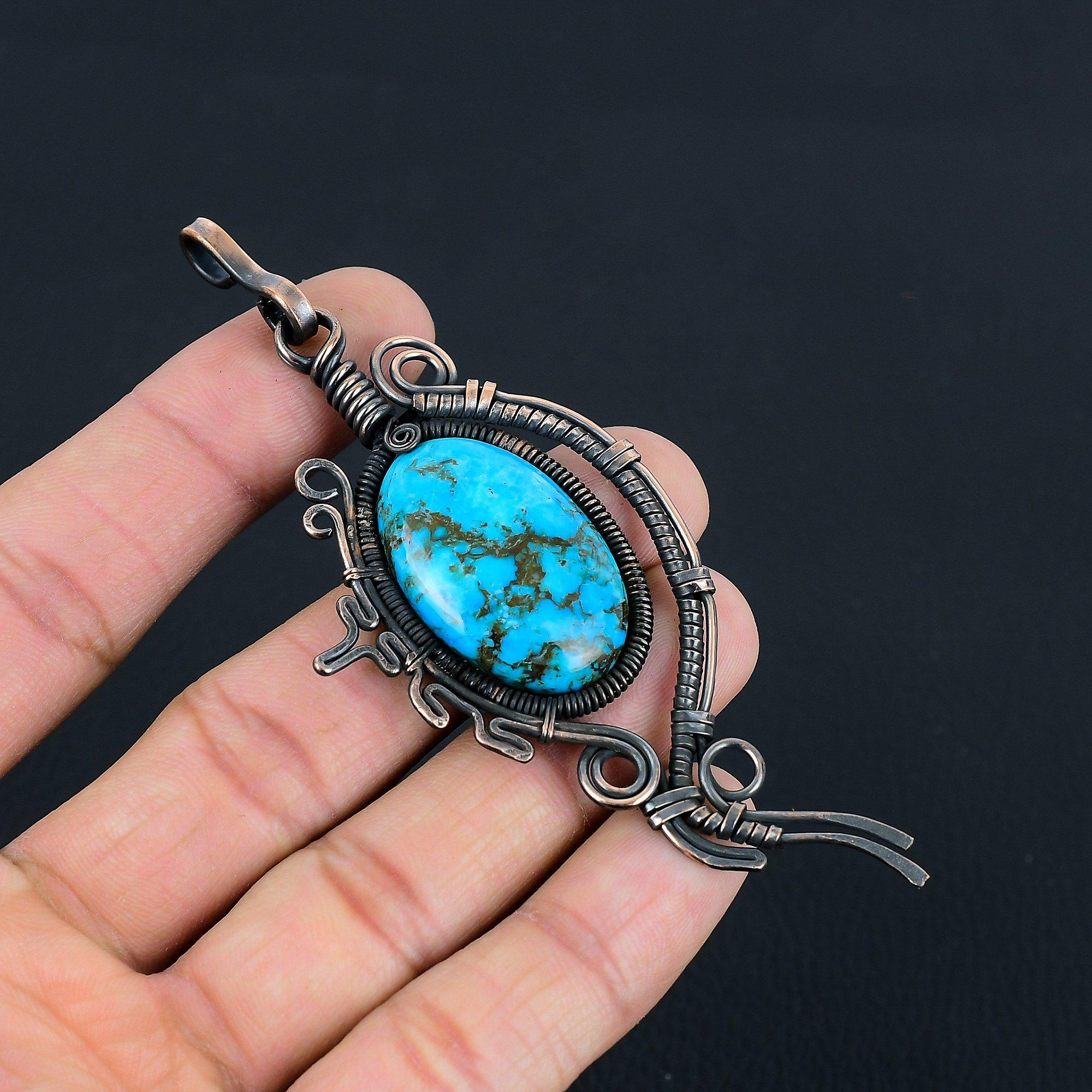 

Изумительный кулон ручной работы из чистой медной проволоки с бирюзовым драгоценным камнем для нее 4.13 Inches синий