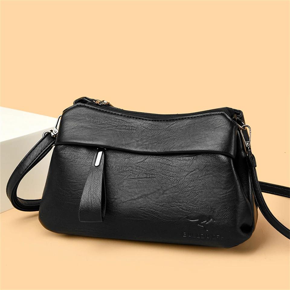 Women's Black Crossbody Bag with Embossed Kangaroo Logo Three Main Compartments Leather Shoulder Bag