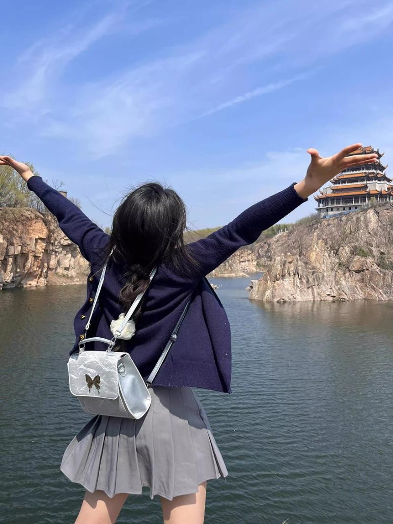 

Large capacity cute bow backpack women s 2025 new Korean version versatile chain backpack student commuter schoolbag