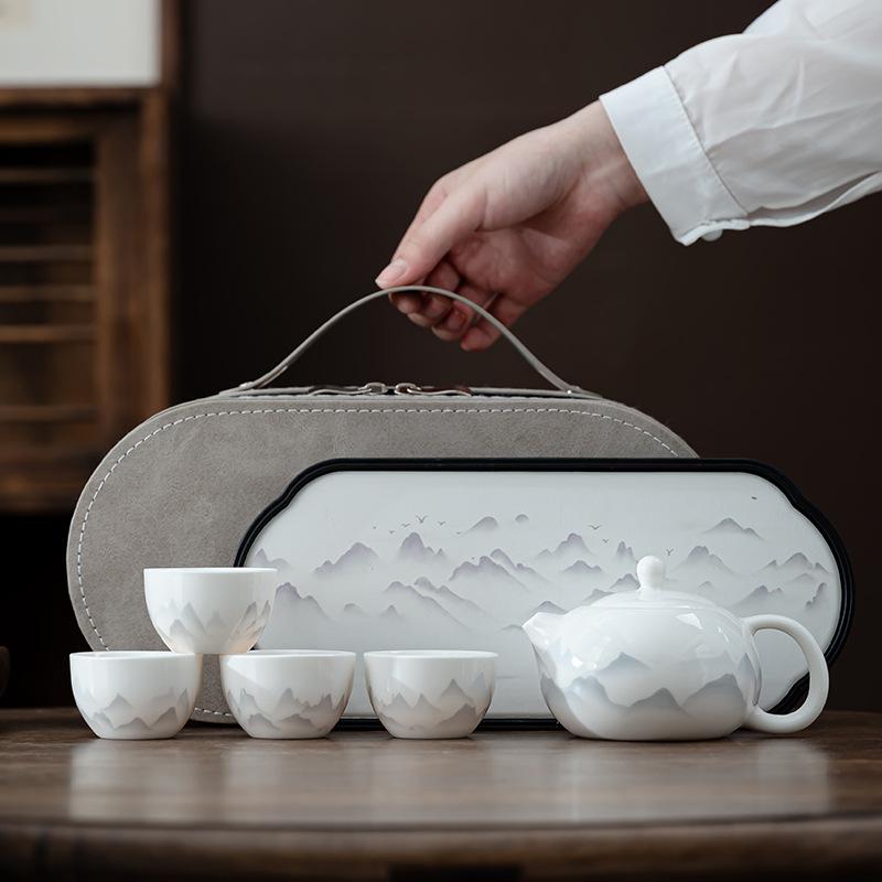 

Chinese ink and wash Dehua white porcelain Kung Fu tea set business office gift box suet jade business gift portable ceramics