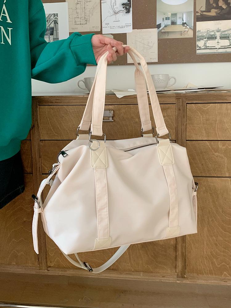 

Trendy 2026 Women s Korean Casual Tote Bag - Large Capacity Hand-Held Travel Messenger Bag.