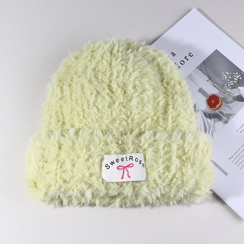 Women's Warm Autumn and Winter Knitted Hat Bow Korean Warm Plush Ear Protection Head Hat