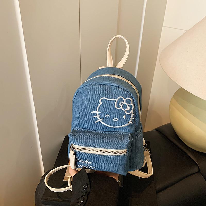 Zaino alla moda in denim con ricamo di lettere di Hello Kitty per l'uso quotidiano