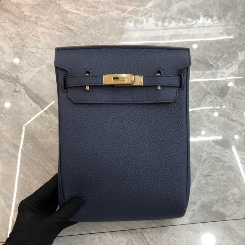 2026 Neues TOGO-Leder geschlechtsneutral gleicher Stil, Rindsleder erste Schicht rundes Schlossloch Brusttasche, einzelne Schulter Kelly-Leder Rucksack