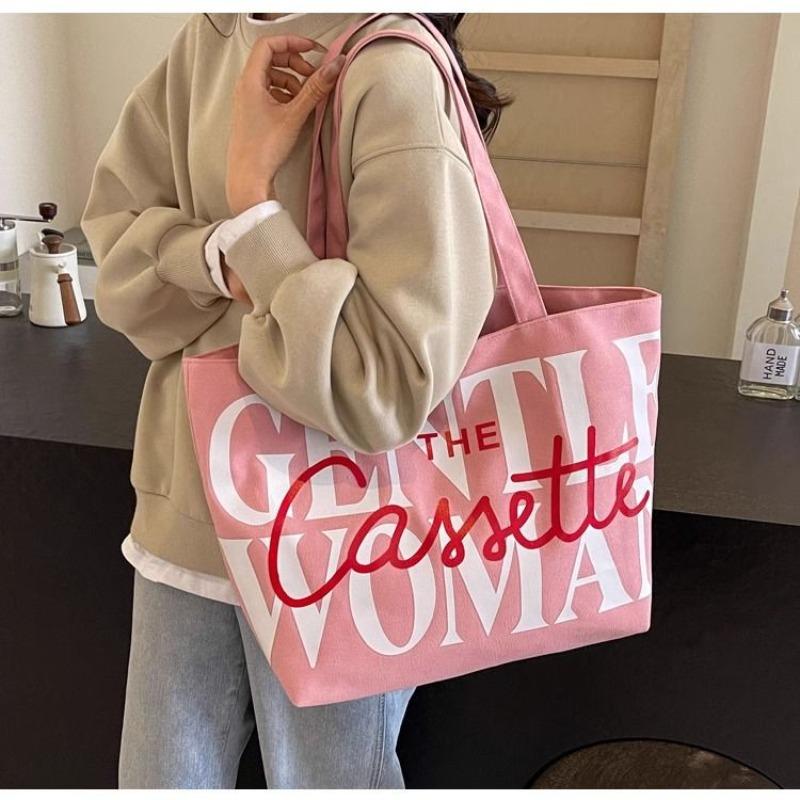 

Korean niche canvas bag women s new fashionable largecapacity tote bag letter shoulder class tote bag розовый