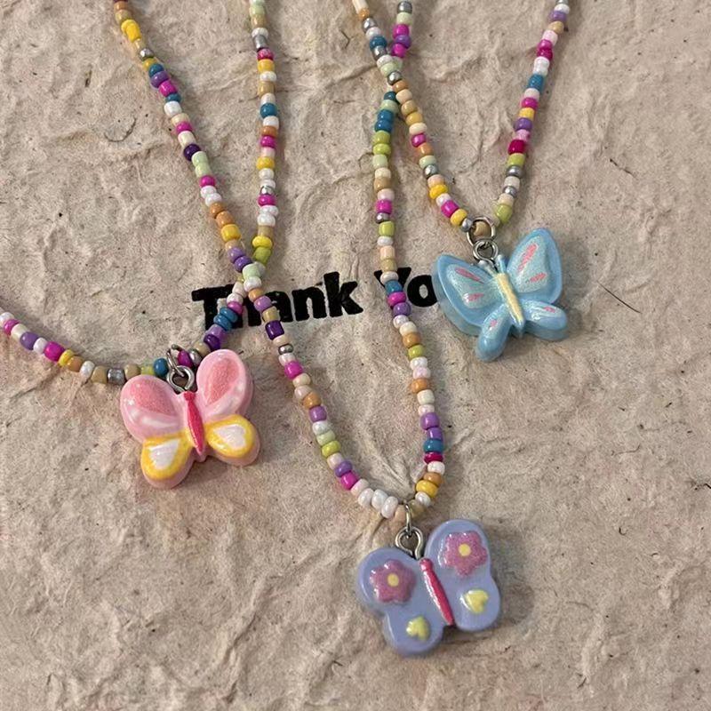 Simple color gradual change painted butterfly beaded necklace women's fashion temperament high sense sweet cool wind versatile collarbone chain