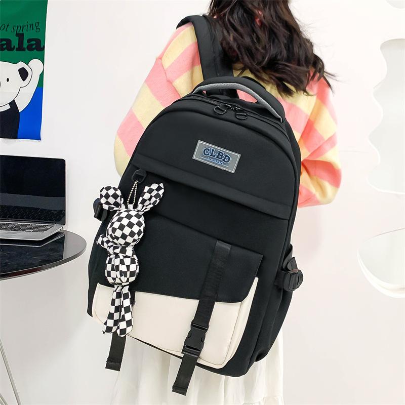 Small fresh color matching and labeling student schoolbag Korean version large-capacity junior high school backpack