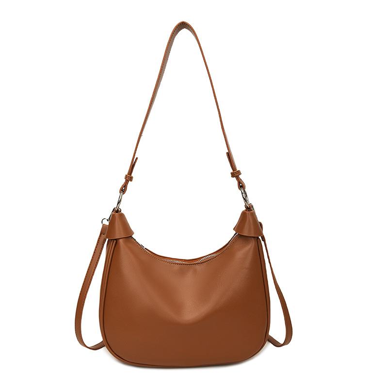 

Retro underarm bag women s high sense 2025 new fashion simple versatile soft leather commuter messenger dumpling bag коричневий
