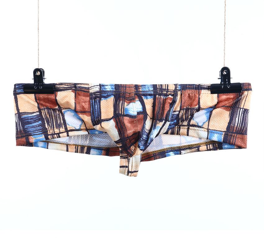 European and American Low-Rise Men's Head Print Mesh Underwear with Moisture-Wicking and Breathable Fabric