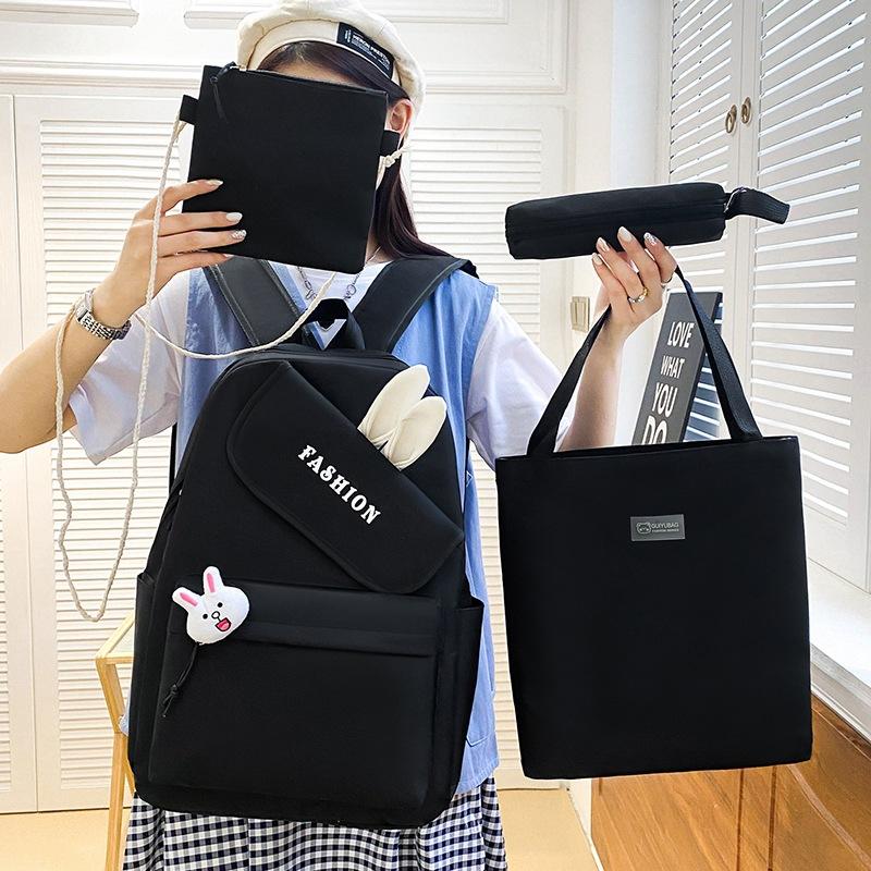 New girl backpack, primary and secondary school schoolbag, make-up bag, four-piece rabbit ear class backpack