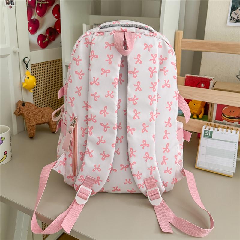 Cute Bow Print Backpack for Women Lightweight Casual Daypack Travel School Bag with Multi Pockets