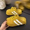 Baotou mezze pantofole da donna abbigliamento esterno 2025 nuova primavera retrò scarpe da ginnastica tedesche comode da donna suola spessa senza tacco scarpe pigre