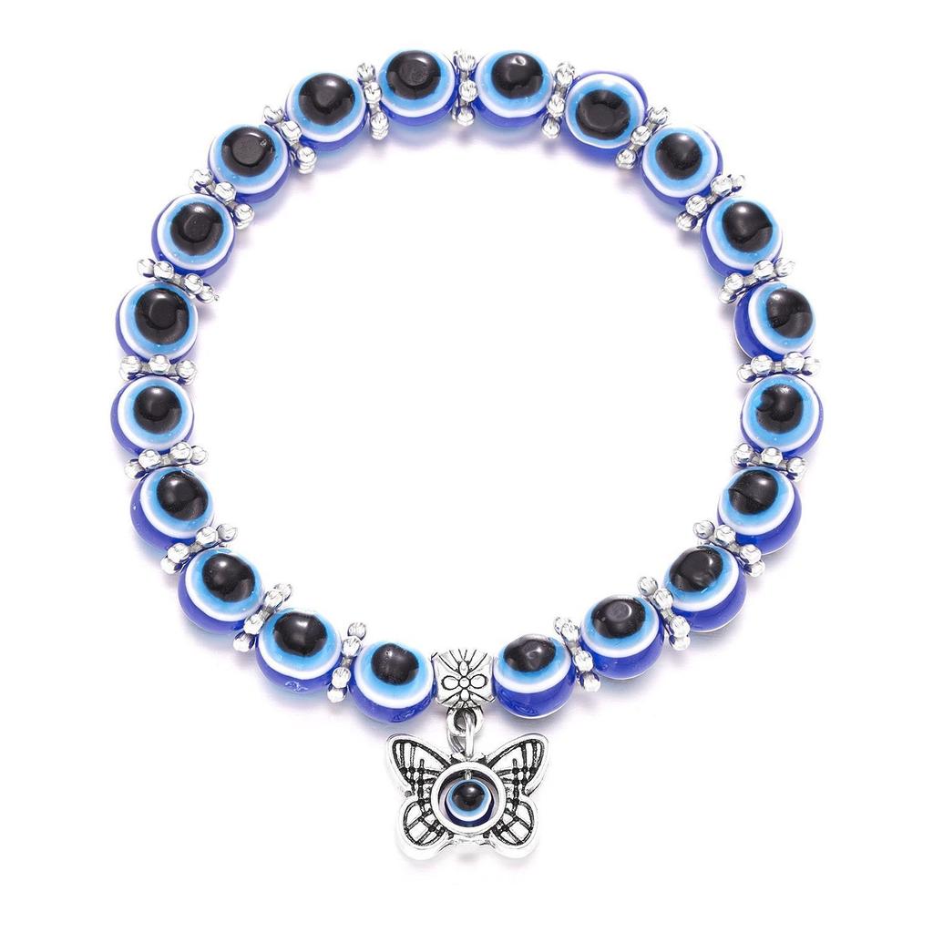 Modisches blaues Perlen-Gummibandarmband mit Schmetterlings- und Schildkrötenanhänger