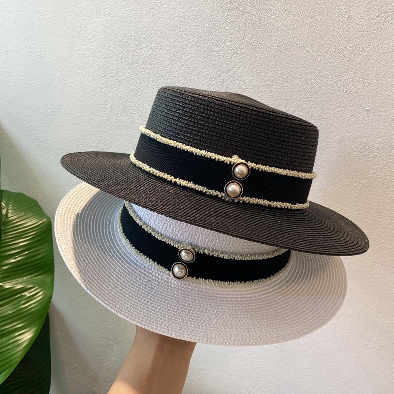 Spring and summer flat top top hat sticker straw woven big eaves hat seaside vacation straw hat sun protection beach hat French sun hat women