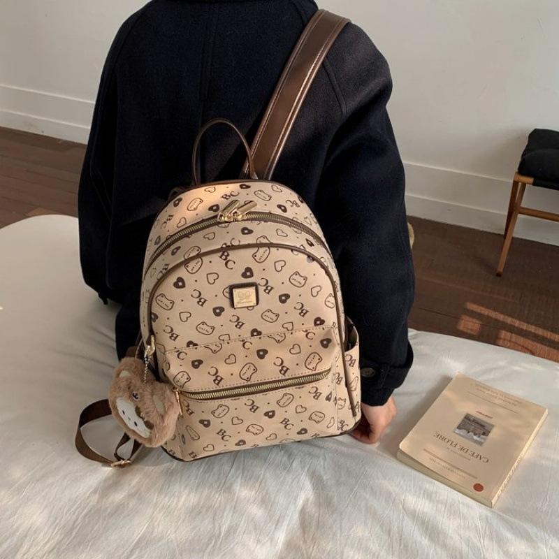 

Korean version of foreign style college students in class casual versatile cartoon pattern girly sense 2025 autumn and winter women s shoulder bag single package