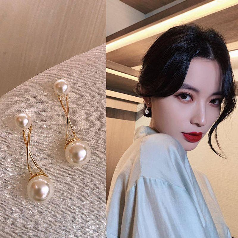 

Fancy Exaggerated Crystal Women s Europe, America, South Korea Flowers Cross Pearl Stud Earrings - Sterling Silver Posts