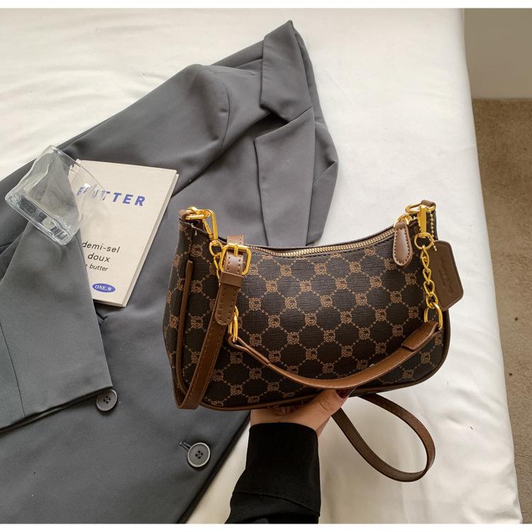 Beliebte einzelne Schulter Achseltasche Sommer neu einfach bedruckt Retro Baguette Tasche lässige Halbmondtasche Tide