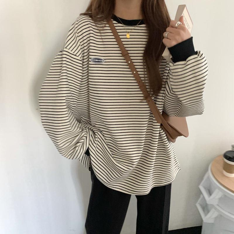 Trendy Korean-Style Women's Striped Long-Sleeve T-Shirt, Perfect for Early Spring Layering or Outerwear.